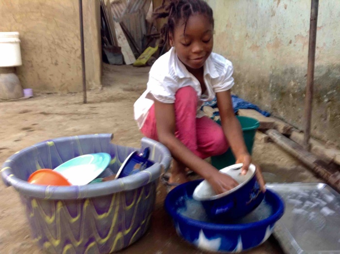 Onarhoda, Igede girl, doing dishes in Ushafa Village, FCT, Abuja, Nigeria. #JujuFilms